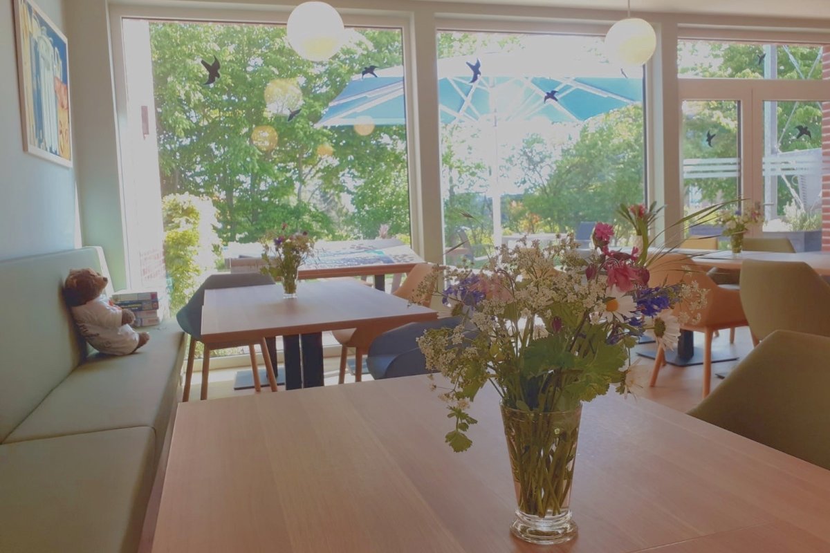 Begegnungsraum m Hospiz